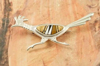 Beautiful Roadrunner Brooch featuring Genuine Picture Jasper, Magnesite and Black Jade inlaid in Sterling Silver.  Designed by Navajo Artist Calvin Begay. Signed by the artist.